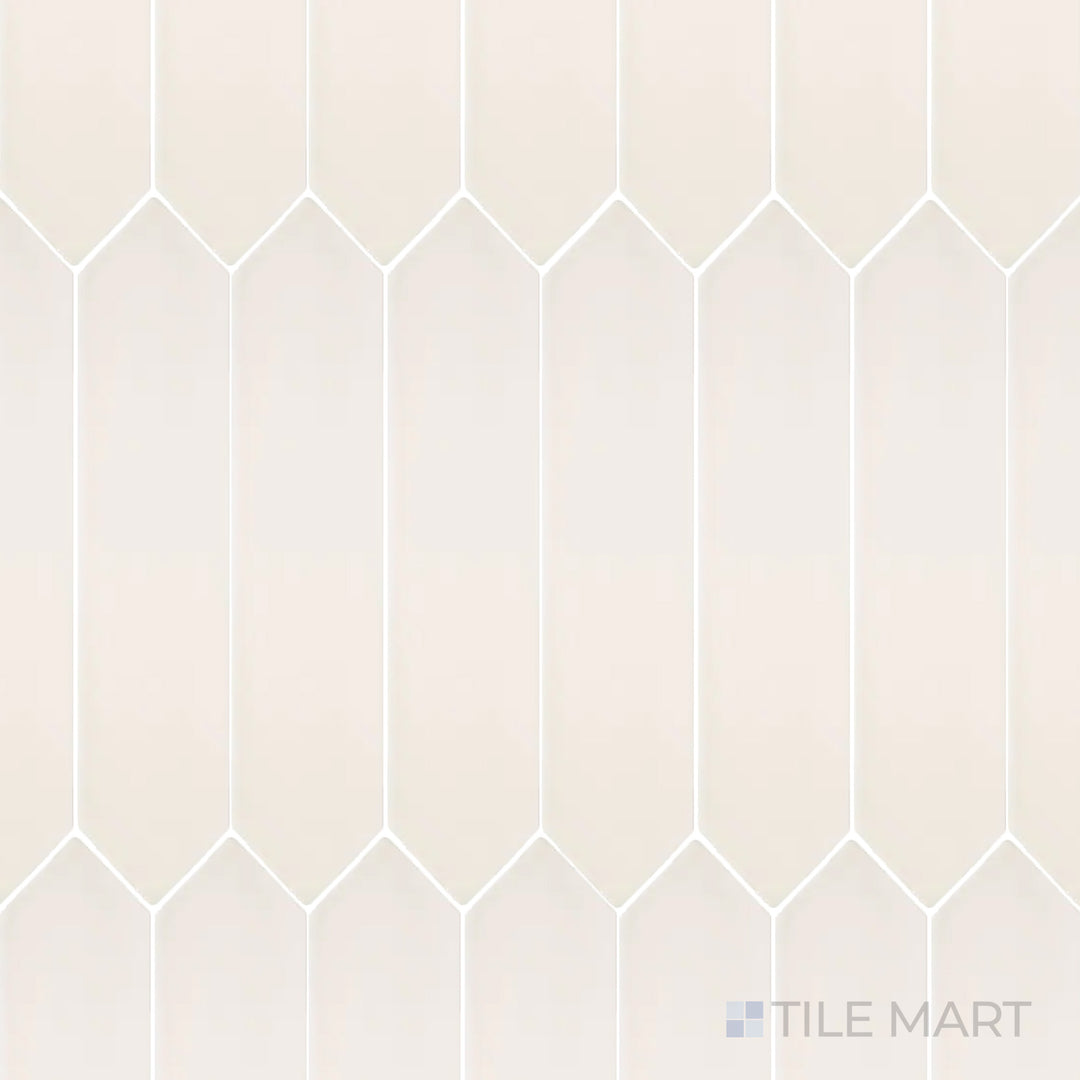 An overhead shot of the Flow White 3x12 inch Picket bright ceramic tile emphasizes its crisp white color and sleek picket shape, adding a unique geometric design element.