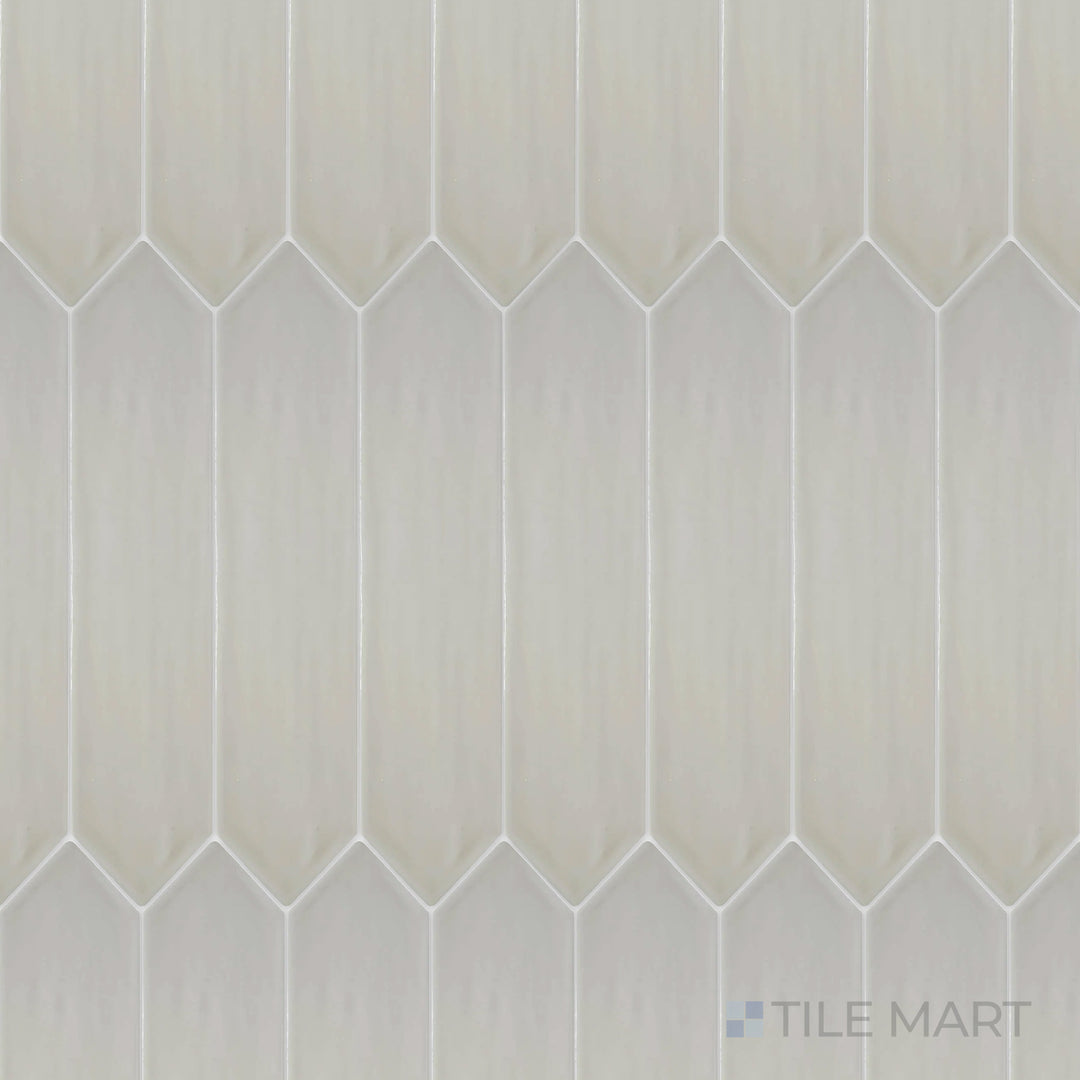 Captured from above, the Flow Tender Gray 3x12 inch Picket bright ceramic tile features a soft gray tone with a glossy finish, offering a modern yet understated charm.