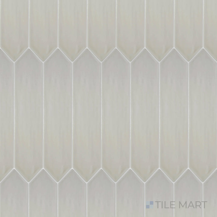 Captured from above, the Flow Tender Gray 3x12 inch Picket bright ceramic tile features a soft gray tone with a glossy finish, offering a modern yet understated charm.
