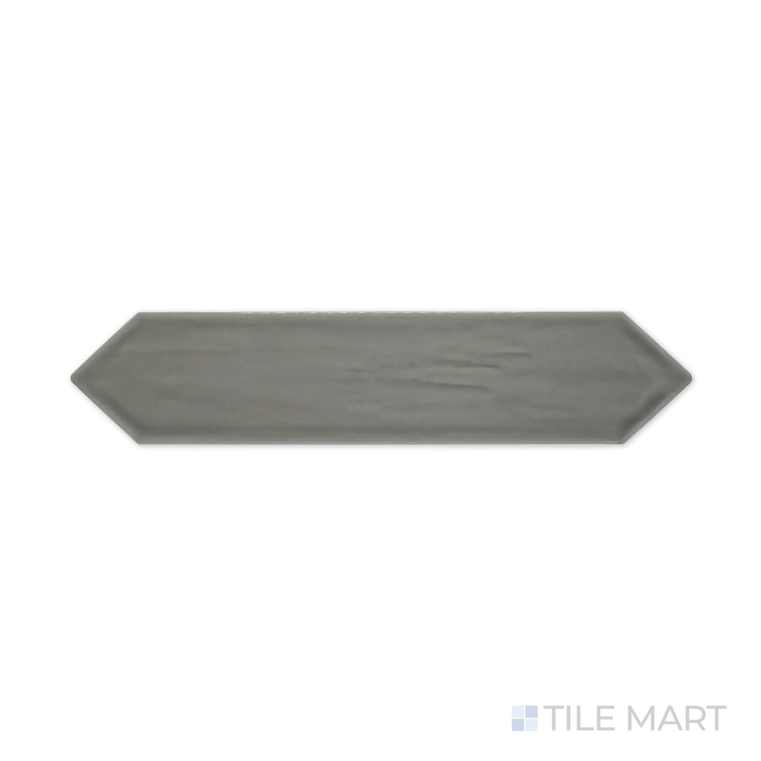 A refined close-up of Flow Dark Gray 3X12 Picket Bright Ceramic highlights its deep charcoal gray hue and elongated picket shape, perfect for contemporary walls.