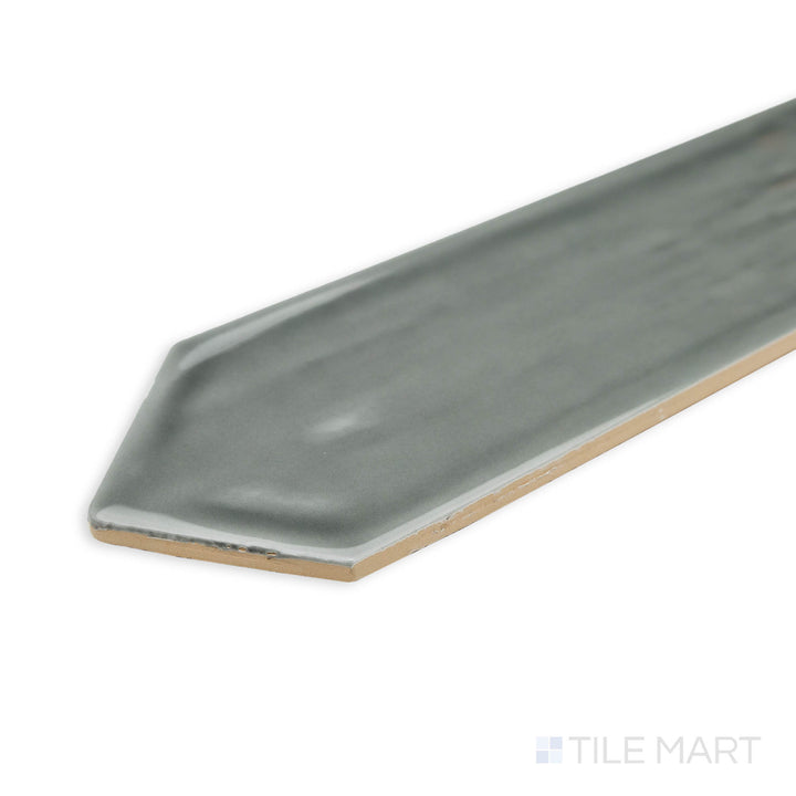 Close-up of Flow Dark Gray 3X12 picket bright ceramic tile at the corner, showcasing its rich charcoal shade, high-gloss finish, and crisp edge detailing.