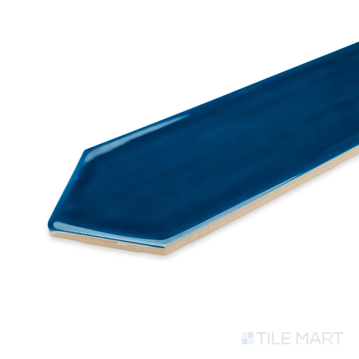 Corner view of Flow Cosmic Sapphire 3X12 picket bright ceramic tile, featuring its deep sapphire color, reflective polish, and seamless tile transition.