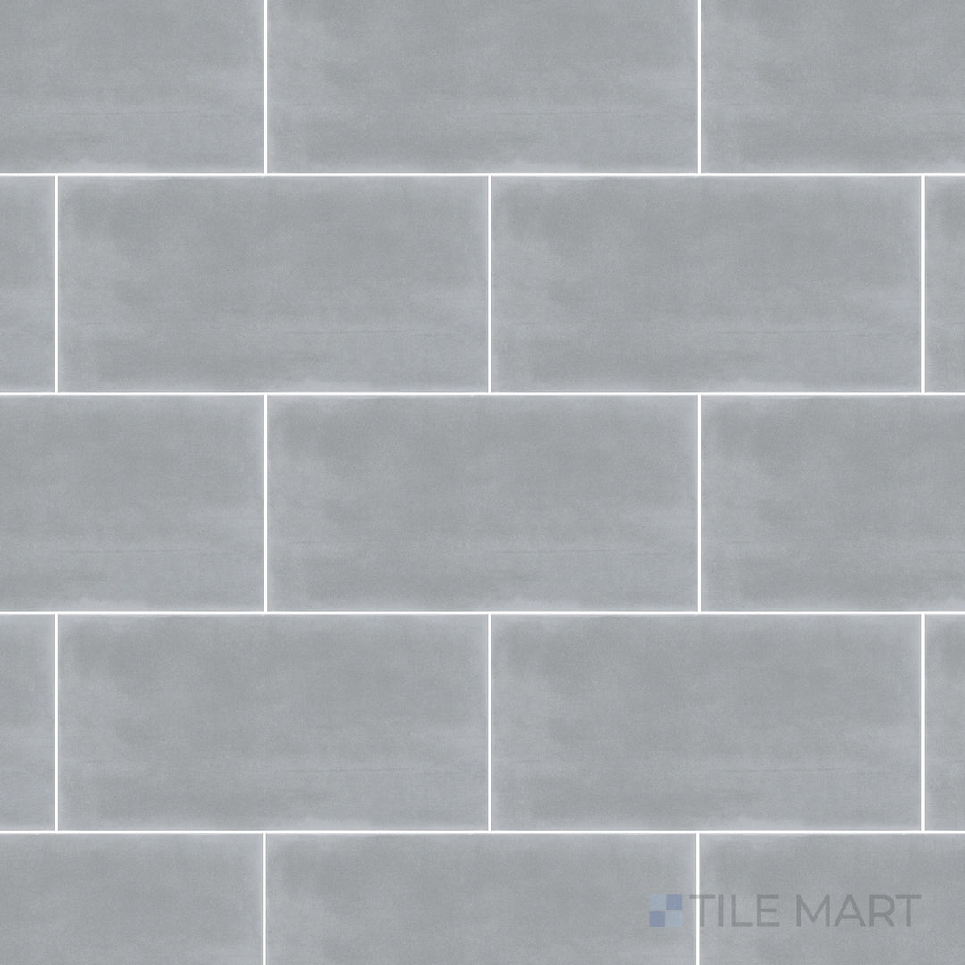 This bird’s-eye perspective of the Maiolica Taupe 3x6 inch bright ceramic tile highlights its earthy taupe shade and high-gloss finish, adding warmth and sophistication.