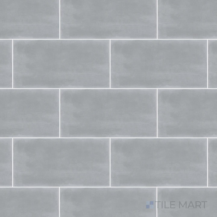 This bird’s-eye perspective of the Maiolica Taupe 3x6 inch bright ceramic tile highlights its earthy taupe shade and high-gloss finish, adding warmth and sophistication.