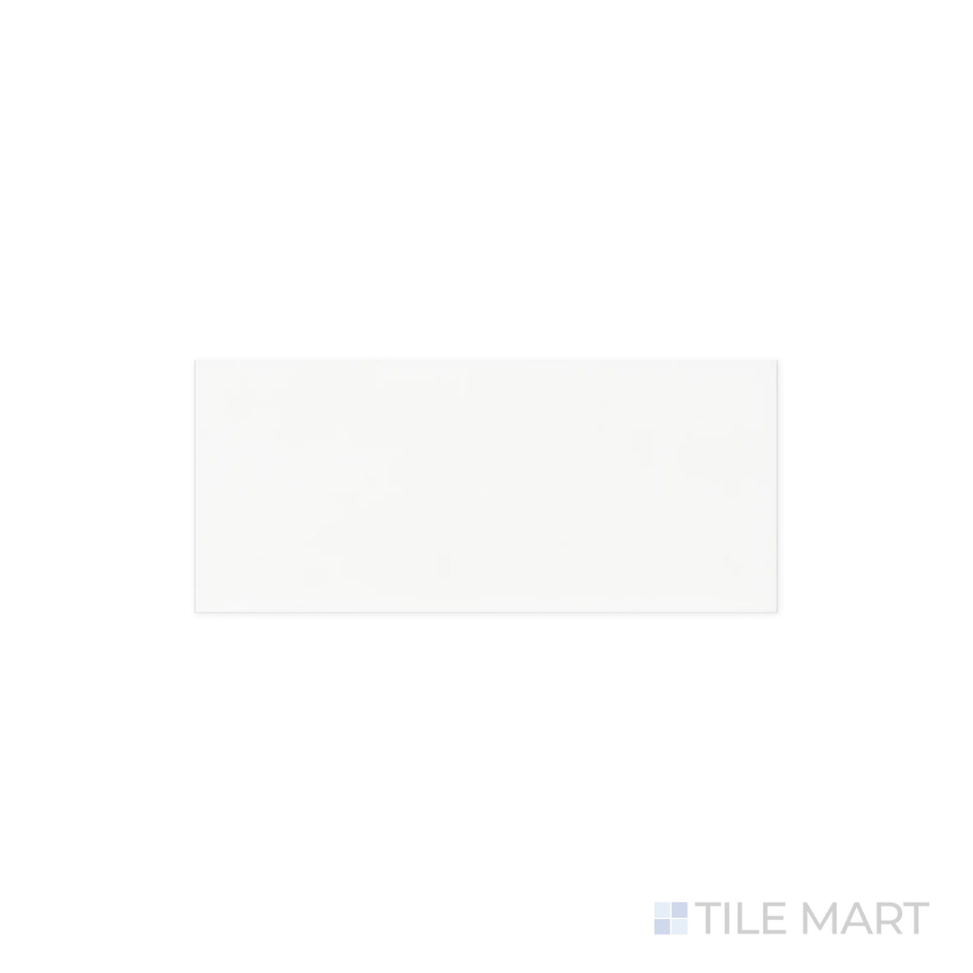 Close-up of Maiolica White 4x10 Bright Ceramic Tile, featuring a smooth, glossy surface that enhances its crisp white color. The reflective finish brings a sense of brightness and depth.