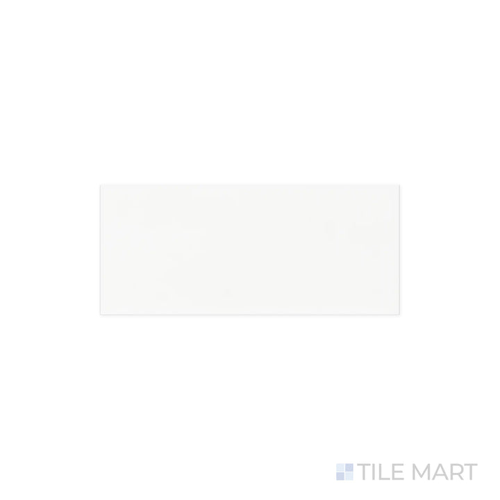 Close-up of Maiolica White 4x10 Bright Ceramic Tile, featuring a smooth, glossy surface that enhances its crisp white color. The reflective finish brings a sense of brightness and depth.