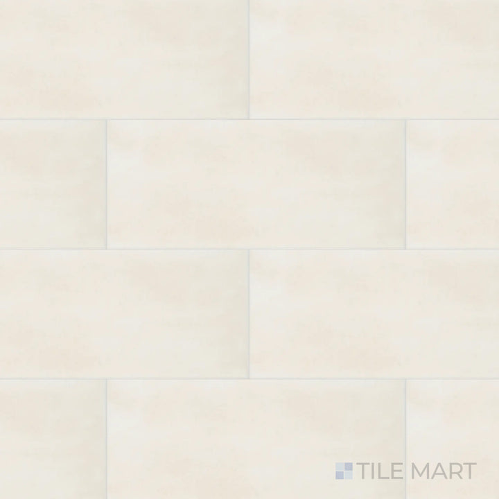 An overhead shot of the Maiolica Biscuit 4x10 inch bright ceramic tile emphasizes its soft beige tone and glossy glaze, enhancing warmth and natural elegance.