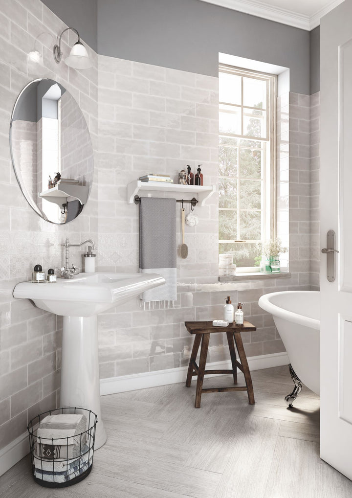 Soft gray hues and a luminous finish give Maiolica Tender Gray 4x10 bright ceramic a subtle and refined elegance.