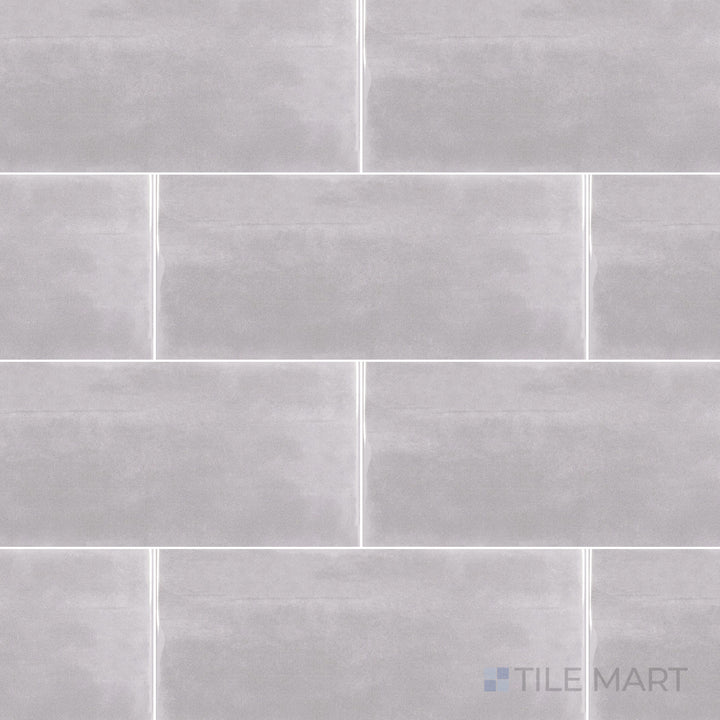 A bird’s-eye view of the Maiolica Tender Gray 4x10 inch matte ceramic tile highlights its soft gray tone and velvety matte texture, ideal for a subtle and contemporary design.