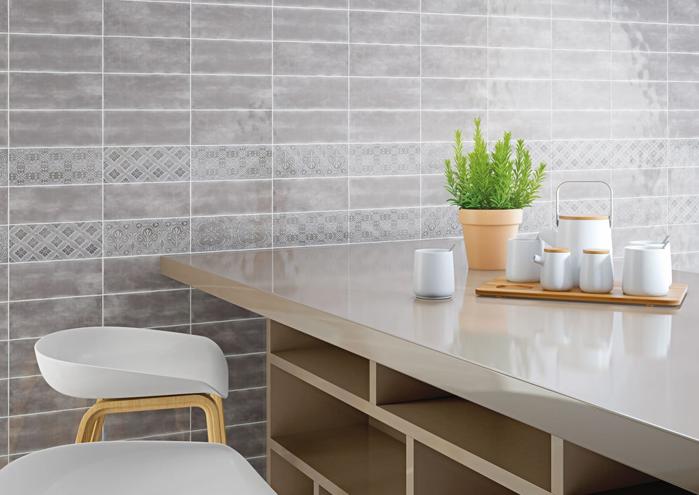 Create a soft and welcoming ambiance with Maiolica Tender Gray 4X10 matte ceramic tile, a versatile neutral for modern aesthetics.