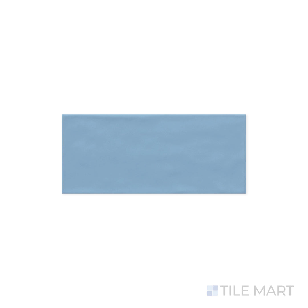 Detailed close-up of Maiolica Blue Steel 4x10 Matte Ceramic Tile, presenting its rich steel-blue color and soft matte surface. The smooth texture adds a refined, modern feel.