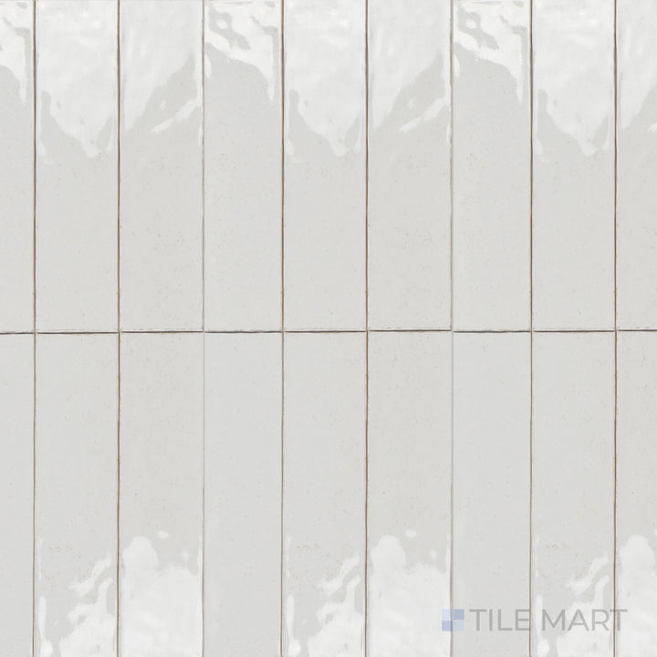An overhead shot of the Maiolica White 3x12 inch bright ceramic tile showcases its pure white tone and high-gloss glaze, perfect for a sleek and modern appearance.