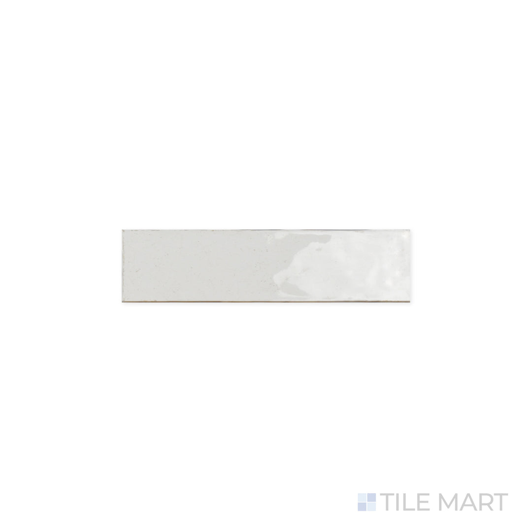 A focused view of Maiolica White 3x12 Bright Ceramic Tile, highlighting its clean white shade and polished surface. The glossy finish enhances depth and reflects surrounding light beautifully.