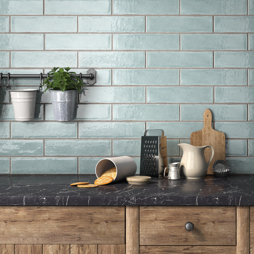 Maiolica Aqua 3x12 bright ceramic tiles featuring a refreshing aqua tone with a glossy surface for a stylish accent.