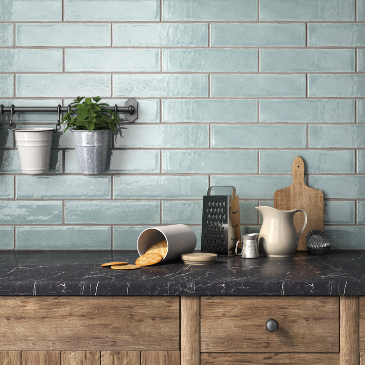 Maiolica Aqua 3x12 bright ceramic tiles featuring a refreshing aqua tone with a glossy surface for a stylish accent.