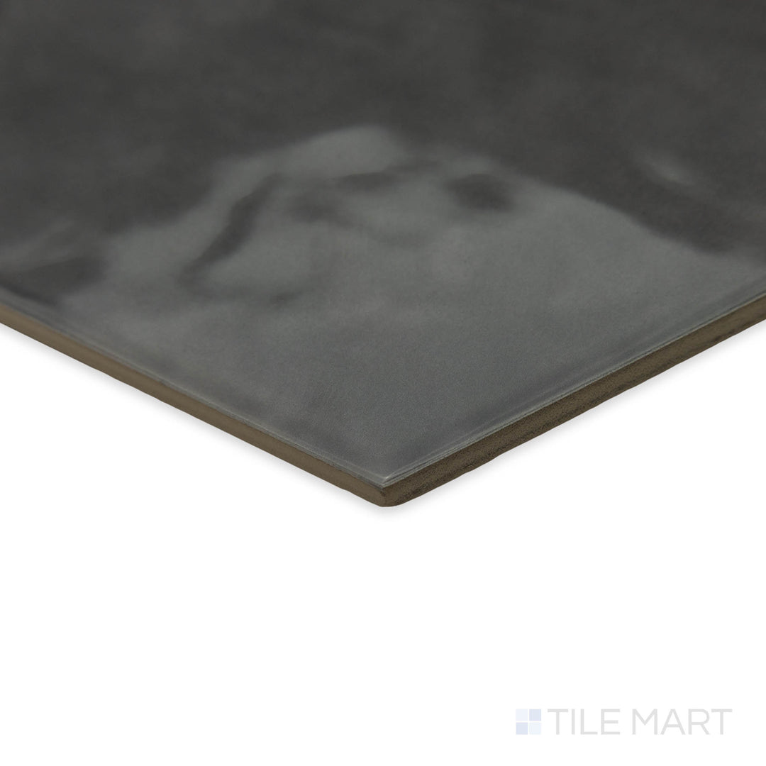 Maiolica Taupe 8" hexagon bright ceramic tile in a stylish corner perspective, showcasing its rich earthy color and luminous glazed finish.