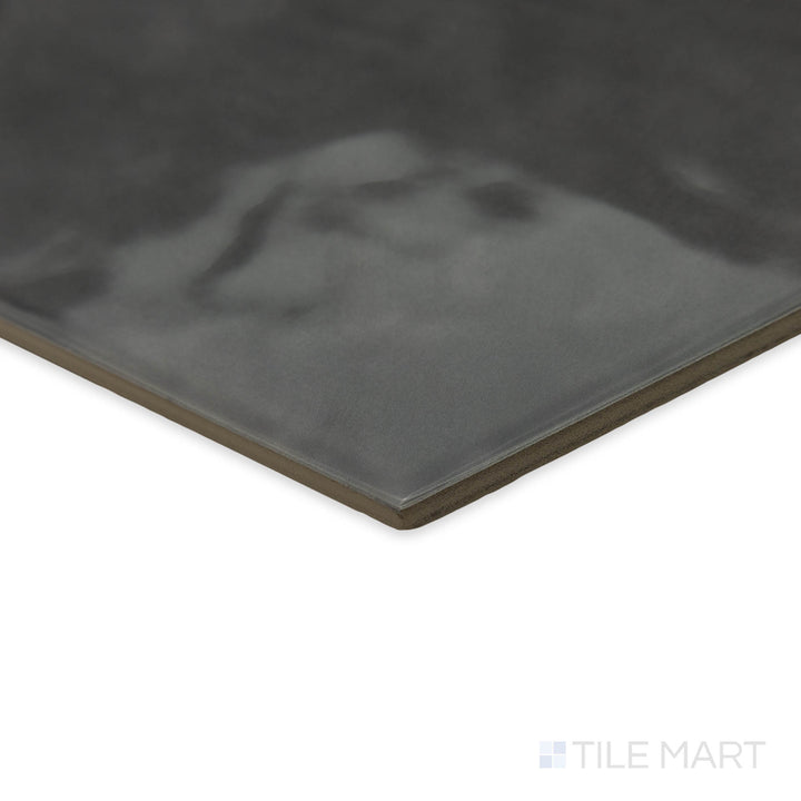 Maiolica Taupe 8" hexagon bright ceramic tile in a stylish corner perspective, showcasing its rich earthy color and luminous glazed finish.