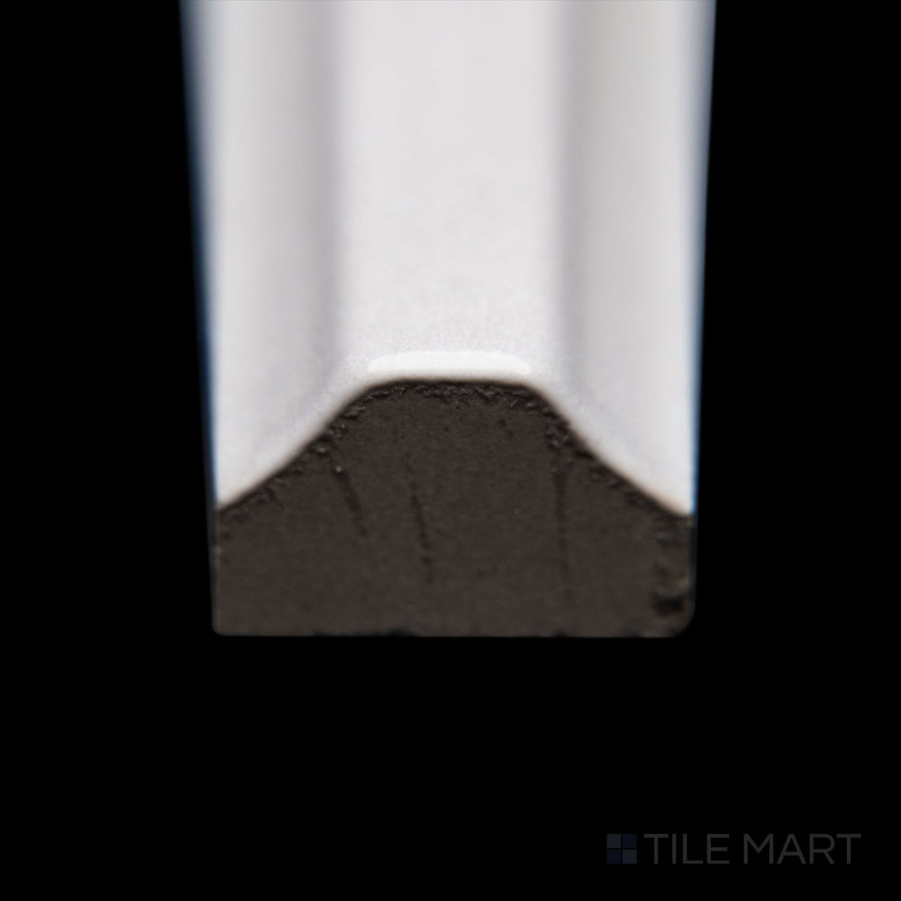 A close-up of Maiolica Tender Gray 0.5X10 bright ceramic pencil, featuring a muted gray shade, polished edge, and sleek glossy finish.