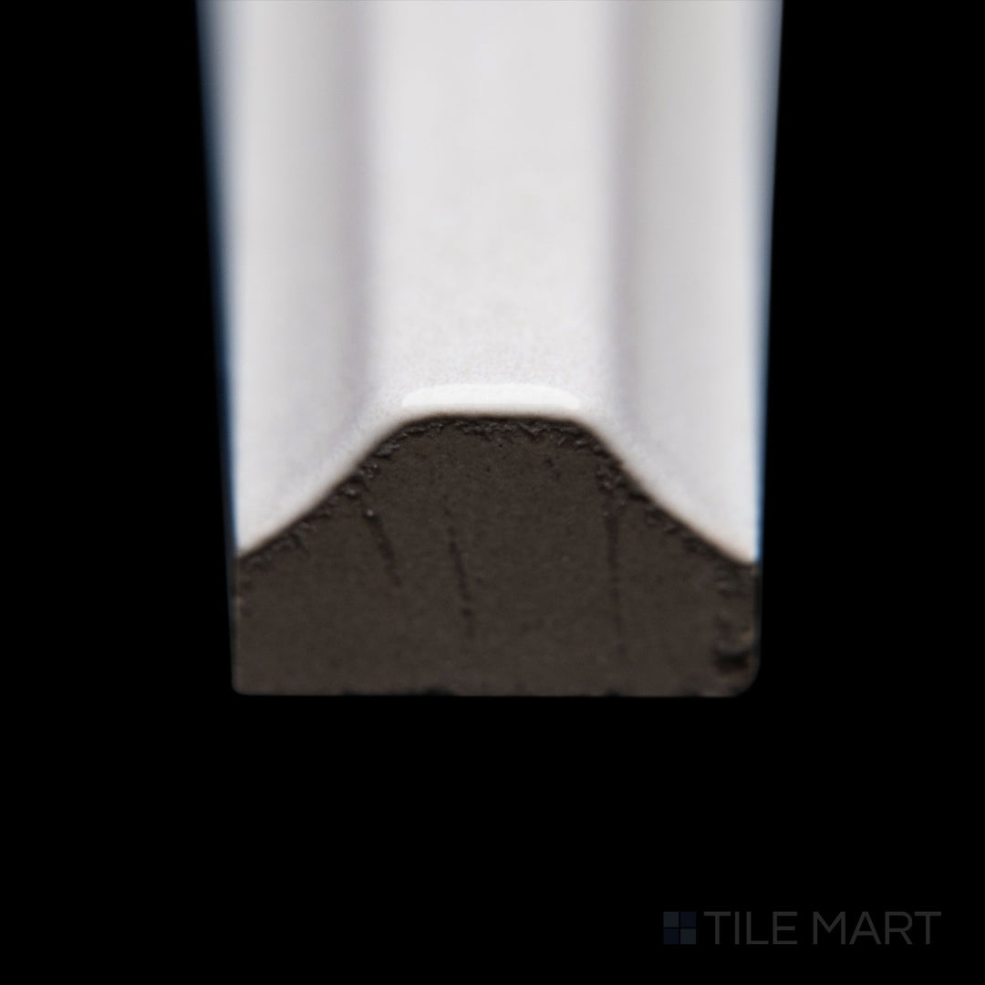 A close-up of Maiolica Tender Gray 0.5X10 bright ceramic pencil, featuring a muted gray shade, polished edge, and sleek glossy finish.