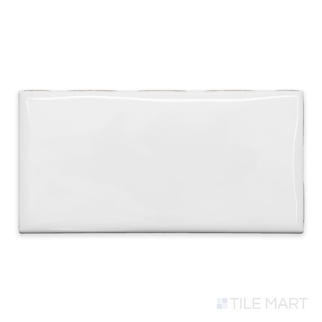A flat-lay shot of Maiolica White 3x6 bright ceramic bullnose, displaying its clean white finish and smooth, polished surface.