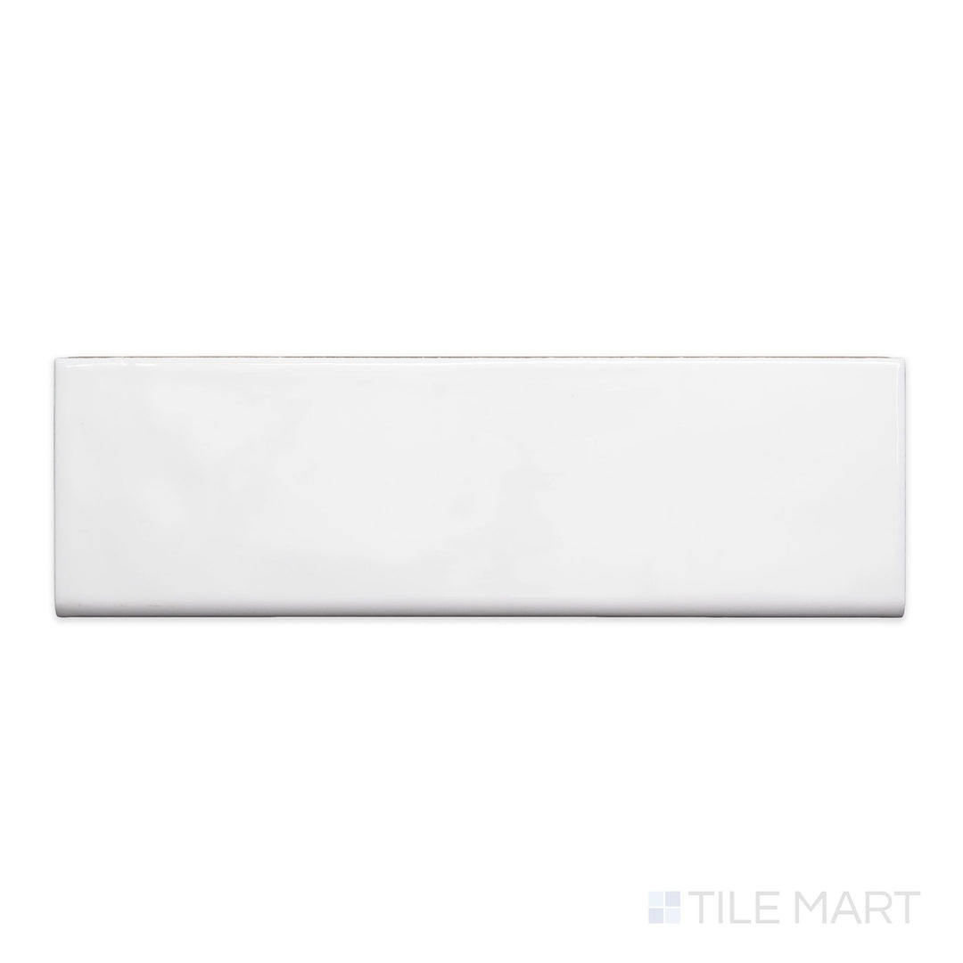 A flat-lay shot of Maiolica White 3x10 bright ceramic bullnose, displaying its bright white tone and high-gloss finish.