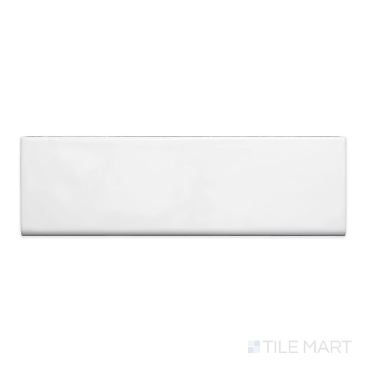 A flat-lay shot of Maiolica White 3x10 bright ceramic bullnose, displaying its bright white tone and high-gloss finish.