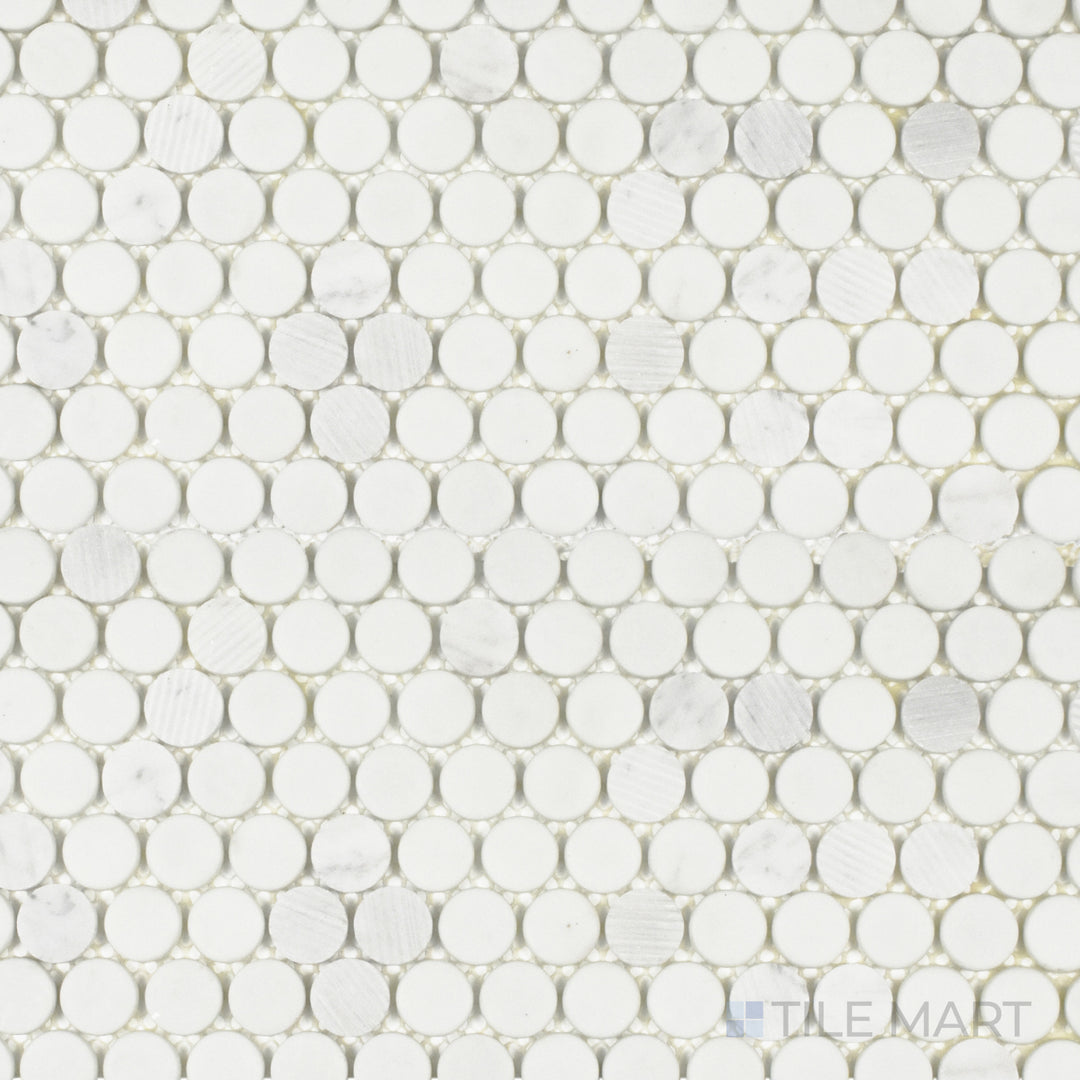 An overhead view of the Rockart Carrara Penny Round mosaic highlights its blend of matte and polished Carrara marble with recycled glass, forming a sophisticated penny-round pattern.