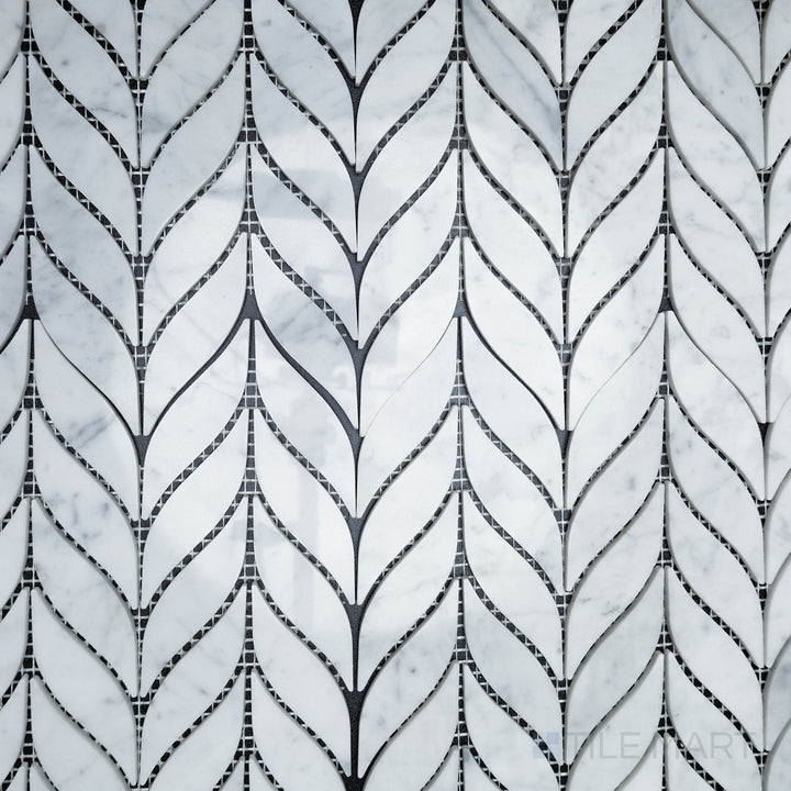 A top-down shot of the Rockart Spike Polished Carrara mosaic presents its striking geometric design with polished Carrara marble, creating a bold and modern aesthetic.