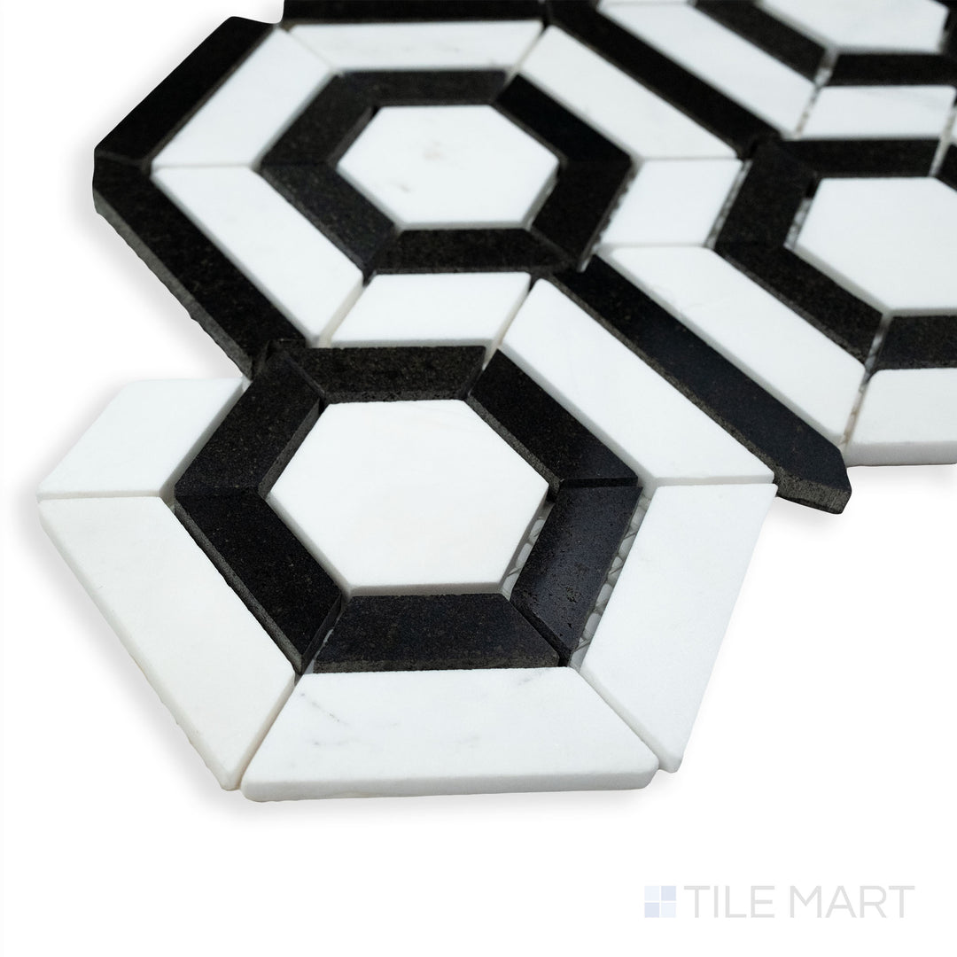 A striking corner shot of Rockart Black & White Hexagon polished Ariston mosaic, featuring a bold geometric pattern with a high-gloss finish.