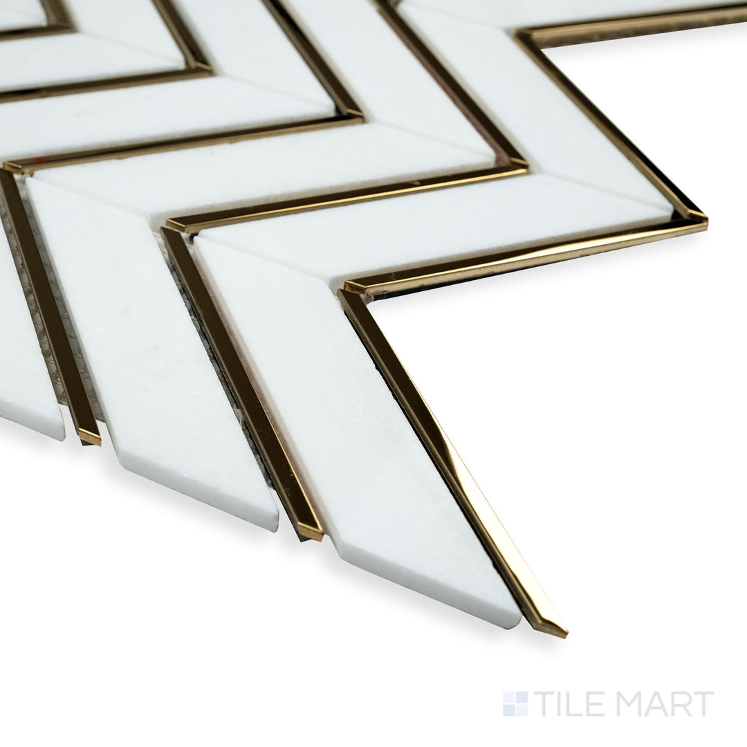 A contemporary corner perspective of Rockart Thassos Metal Arrow marble mosaic, showcasing its sharp arrow-shaped design and polished white marble finish.