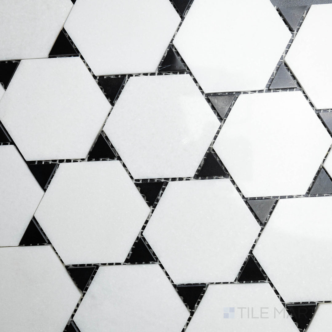 This bird’s-eye perspective of the Rockart Thassos & Nero Marquina Dot Polished Mosaic showcases a striking mix of white and black marble in a contrasting dot pattern, perfect for dynamic designs.
