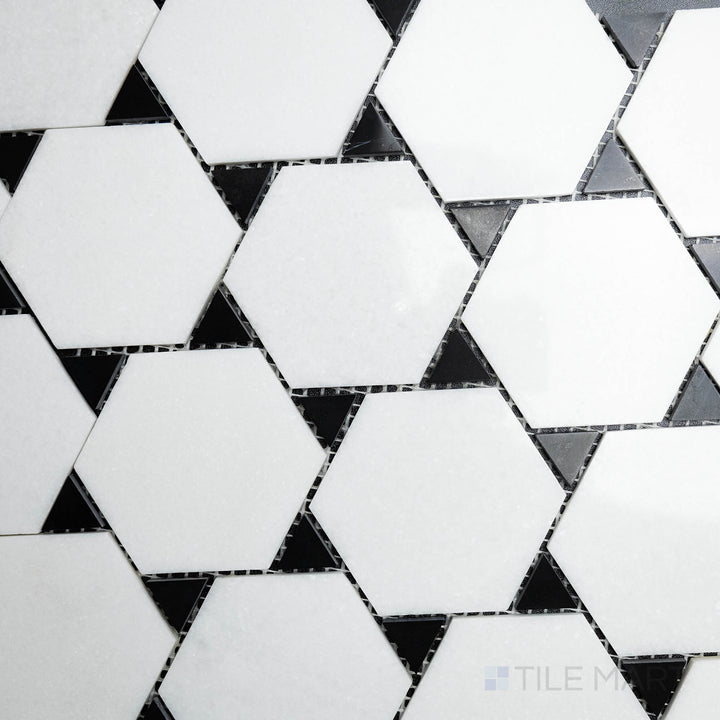 This bird’s-eye perspective of the Rockart Thassos & Nero Marquina Dot Polished Mosaic showcases a striking mix of white and black marble in a contrasting dot pattern, perfect for dynamic designs.