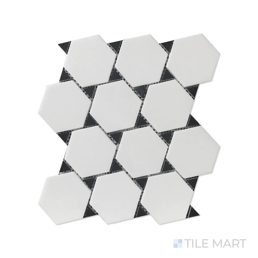 Detailed look at Rockart Thassos & Nero Marquina Dot Polished Mosaic, blending crisp white and deep black marble in a playful yet sophisticated dot pattern.