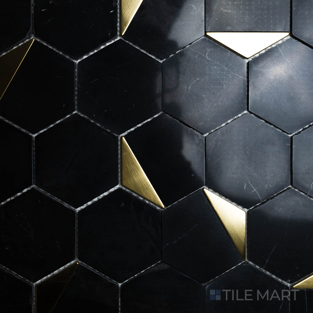 An overhead shot of the Rockart Nero Marquina Hexagon Polished Mosaic emphasizes its bold black marble with natural veining, arranged in a contemporary hexagonal layout for a striking statement.