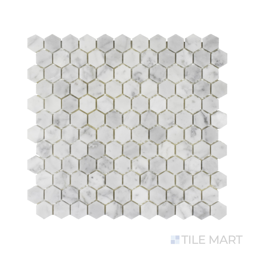 A refined close-up of Rockart Carrara Marble 1" Hexagon Mosaic, featuring classic Carrara marble in a modern hexagonal layout with natural veining.