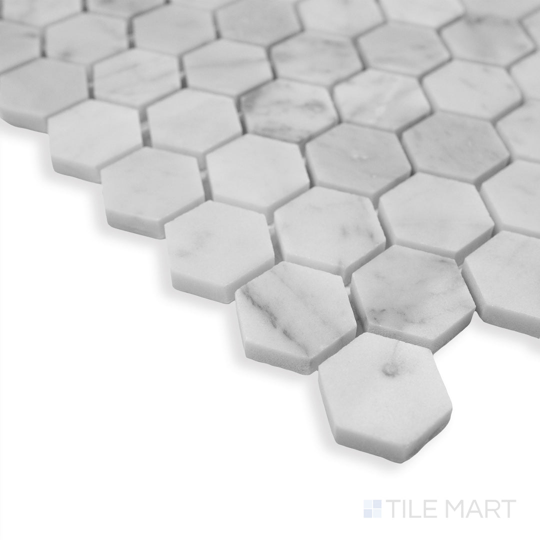 A stylish corner shot of Rockart Carrara Marble 1" Hexagon mosaic, emphasizing its small-scale hexagonal design and timeless white marble appeal.