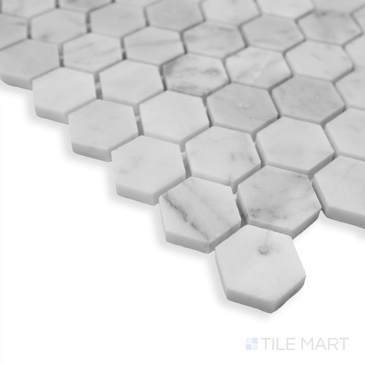 A stylish corner shot of Rockart Carrara Marble 1" Hexagon mosaic, emphasizing its small-scale hexagonal design and timeless white marble appeal.