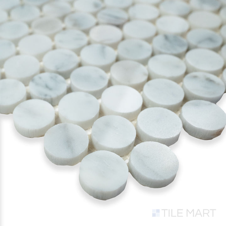 Rockart Carrara Marble Penny Round mosaic in a detailed corner shot, emphasizing its classic penny tile design with a polished white marble finish.