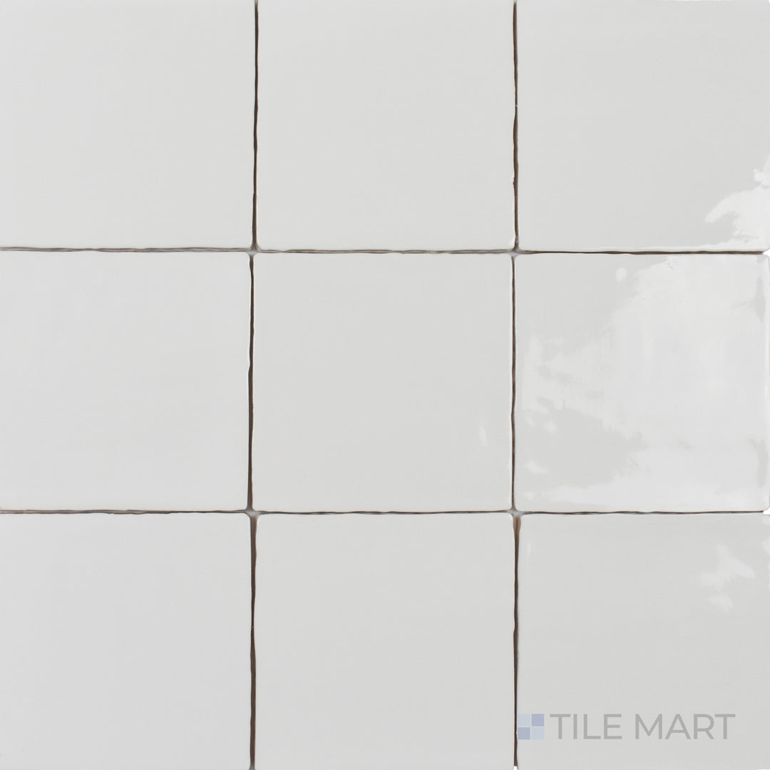 Seen from above, the St. Tropez Blanco 5x5 inch bright ceramic tile features a crisp white shade with a high-gloss finish, enhancing brightness and sophistication.