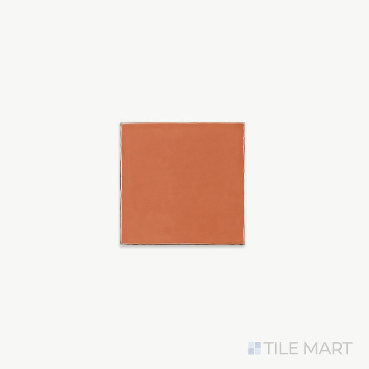 Detailed close-up of St. Tropez Coral 5X5 Bright Ceramic, highlighting its vibrant coral hue and sleek glazed finish for a refreshing aesthetic.