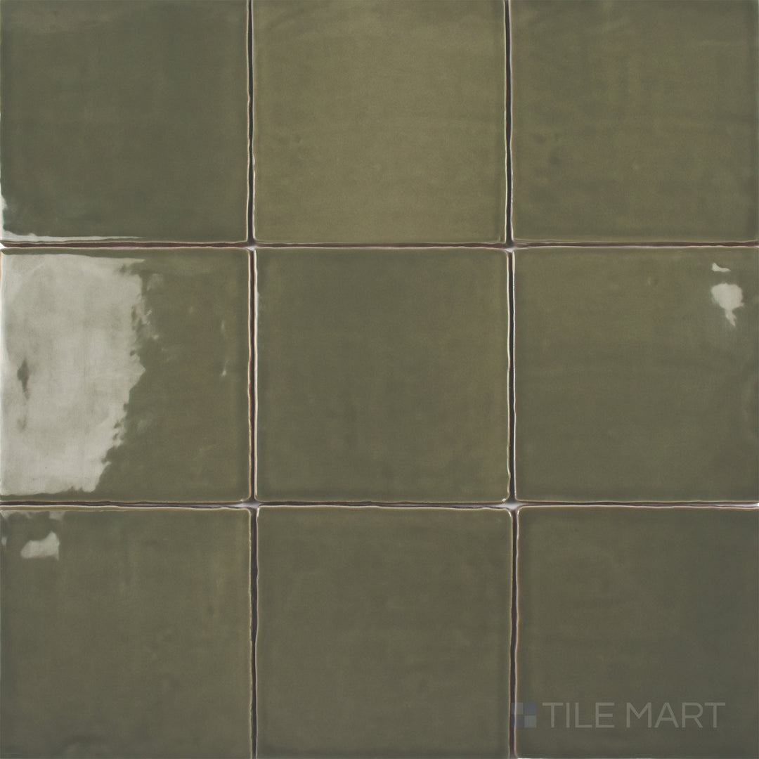 A top-down perspective of the St. Tropez Verde 5x5 inch bright ceramic tile displays its fresh green shade and polished surface, adding a natural and lively touch to walls.