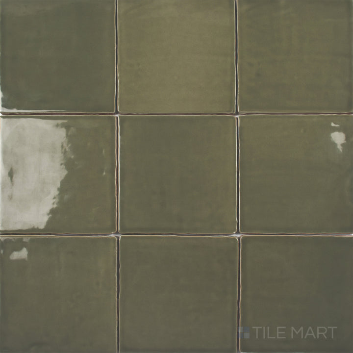 A top-down perspective of the St. Tropez Verde 5x5 inch bright ceramic tile displays its fresh green shade and polished surface, adding a natural and lively touch to walls.