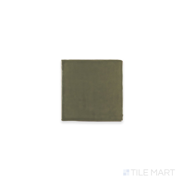 Close-up of St. Tropez Verde 5X5 Bright Ceramic, featuring its lush green shade and polished ceramic surface that enhances color depth.