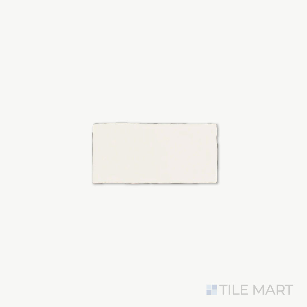 Zoomed-in view of St. Tropez Blanco 2.5X5 Bright Ceramic, emphasizing its crisp white tone and gleaming surface that radiates brightness.