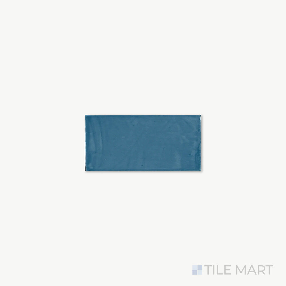 Zoomed-in look at St. Tropez Azul 2.5X5 Bright Ceramic, featuring deep blue tones and a smooth glossy finish that enhances its bold presence.