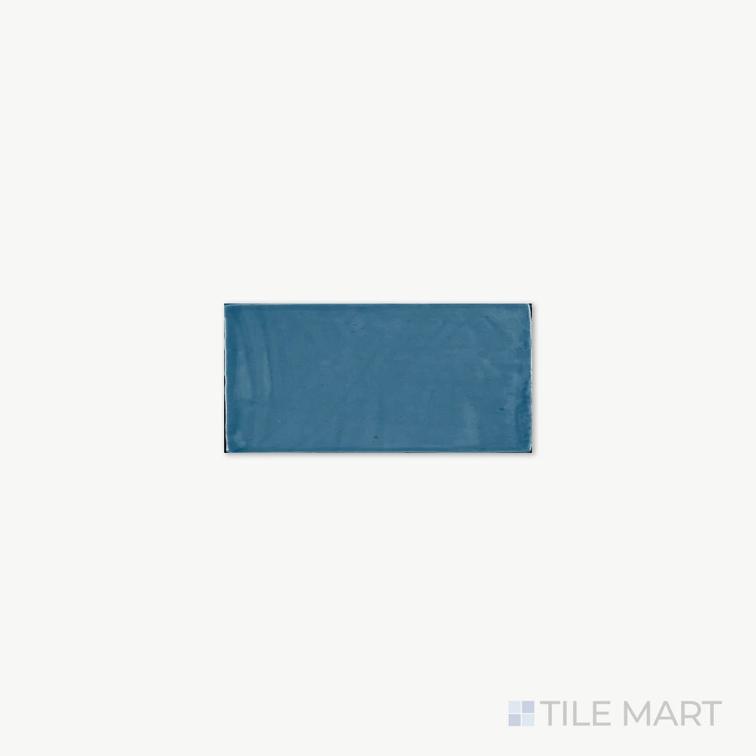 Zoomed-in look at St. Tropez Azul 2.5X5 Bright Ceramic, featuring deep blue tones and a smooth glossy finish that enhances its bold presence.
