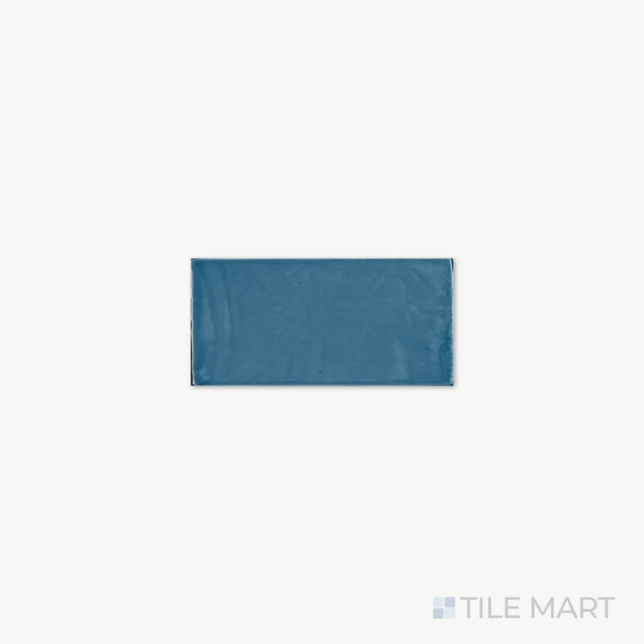 Zoomed-in look at St. Tropez Azul 2.5X5 Bright Ceramic, featuring deep blue tones and a smooth glossy finish that enhances its bold presence.