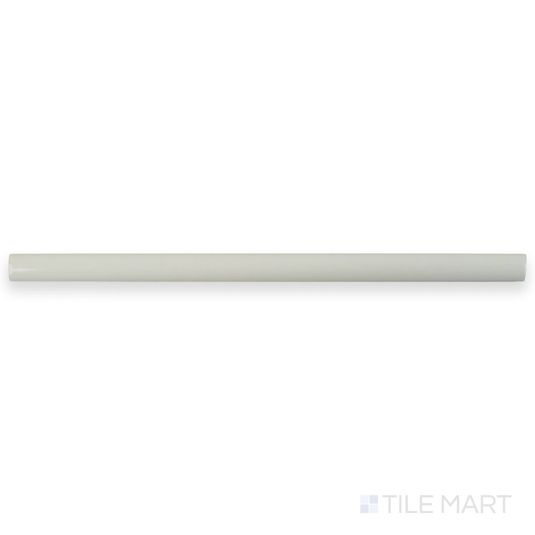 A flat lay of Zellige White 0.75x16 Bright ceramic pencil tile, highlighting its slender shape, glossy white surface, and clean linear form.