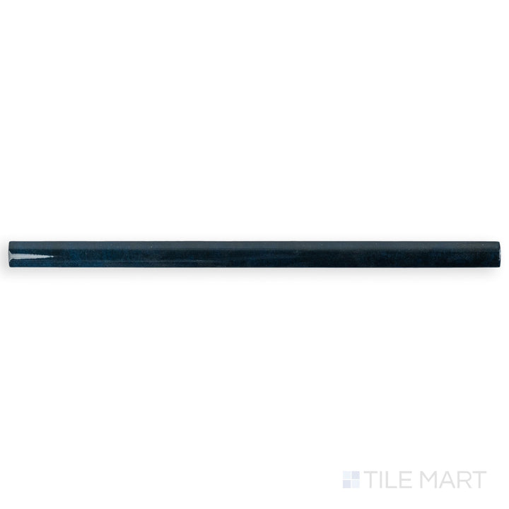 Top-down image of Zellige Deep Blue 0.75x16 Bright ceramic pencil tile, emphasizing its intense blue gloss and pencil-thin trim profile.
