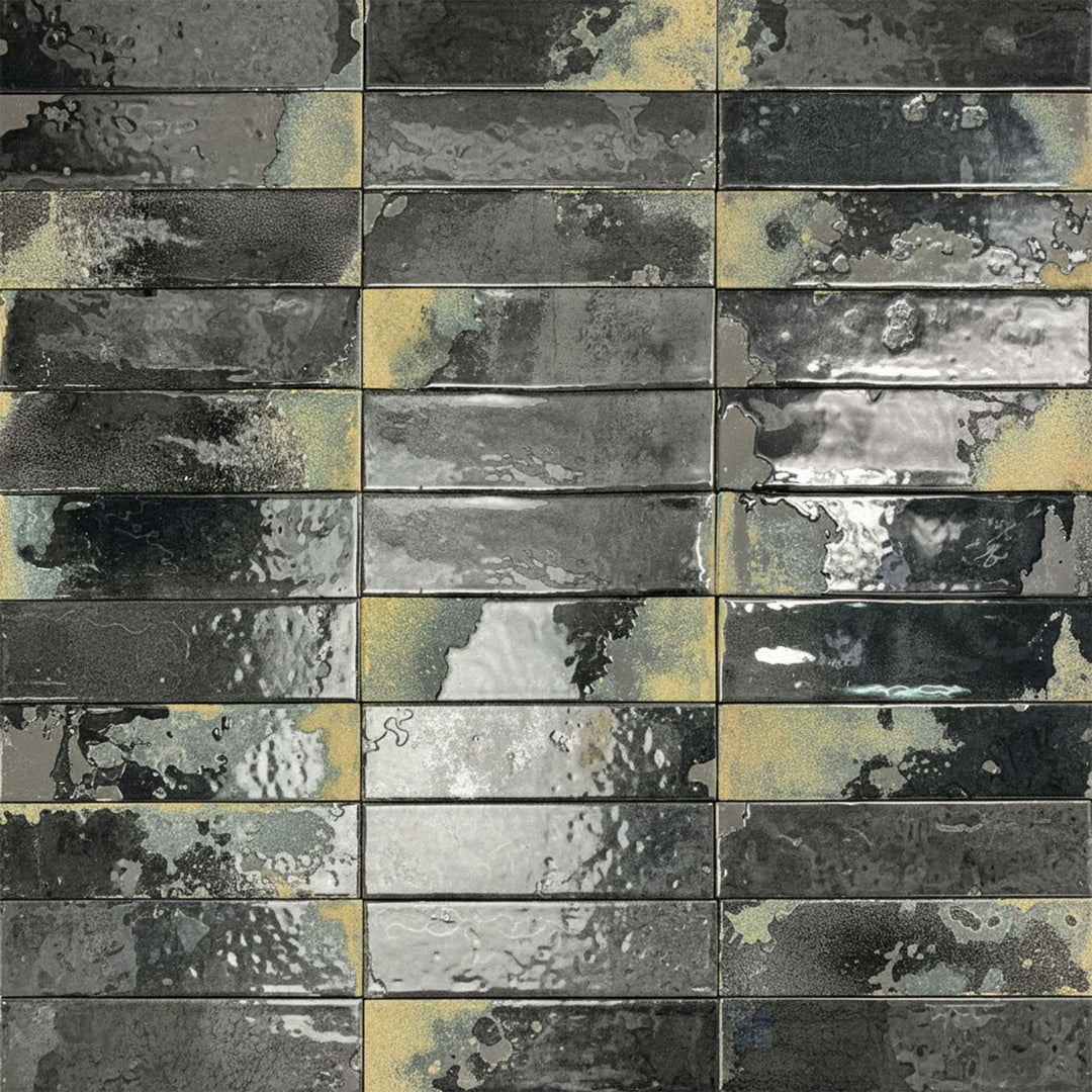 A sleek porcelain tile in deep carbon black, finished with a high-gloss surface and elongated 2.5x9 shape.